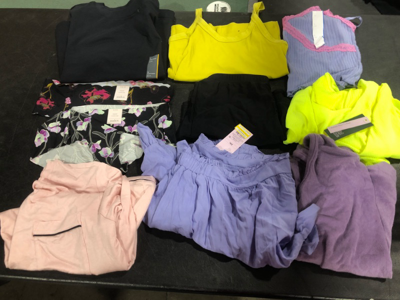 Photo 1 of A VARIETY OF WOMENS CLOTHES / DIFFERENT SIZES