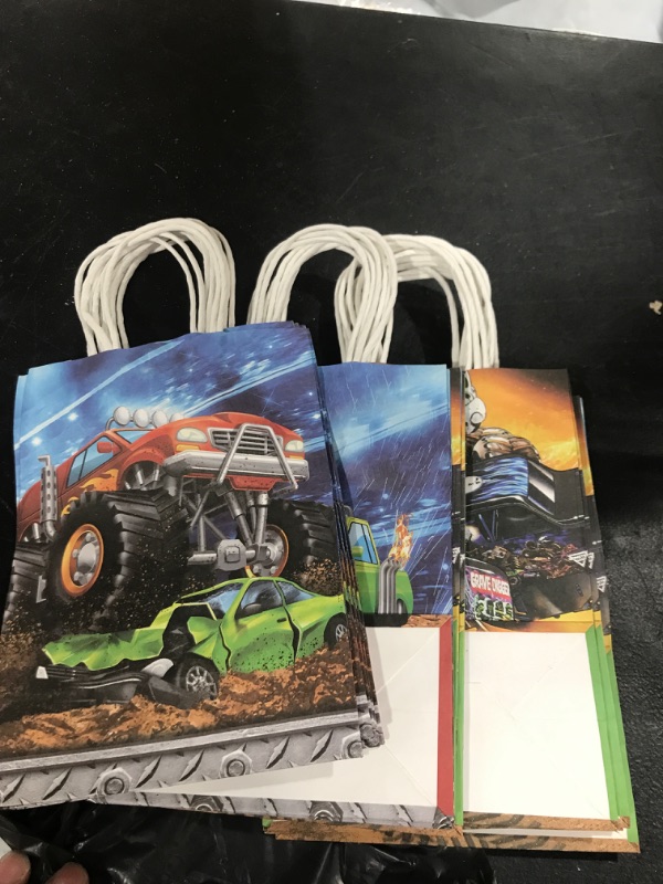 Photo 2 of 16 Pcs Monster Truck Party Paper Gift Bags, 4 Styles Party Favor Bags with Handles for Monster Truck Party Decorations, Goody Bags Candy Gift Bags for Girls Boys Birthday Party Supplies Favors