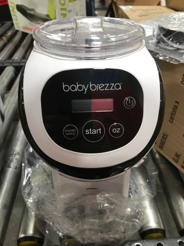 Photo 4 of Baby Brezza Formula Pro Mini Baby Formula Maker – Small Baby Formula Mixer Machine Fits Small Spaces and is Portable for Travel– Bottle Makers Makes The Perfect Bottle for Your Infant On The Go Formula Pro Mini Dispenser Machine