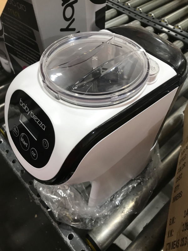 Photo 5 of Baby Brezza Formula Pro Mini Baby Formula Maker – Small Baby Formula Mixer Machine Fits Small Spaces and is Portable for Travel– Bottle Makers Makes The Perfect Bottle for Your Infant On The Go Formula Pro Mini Dispenser Machine