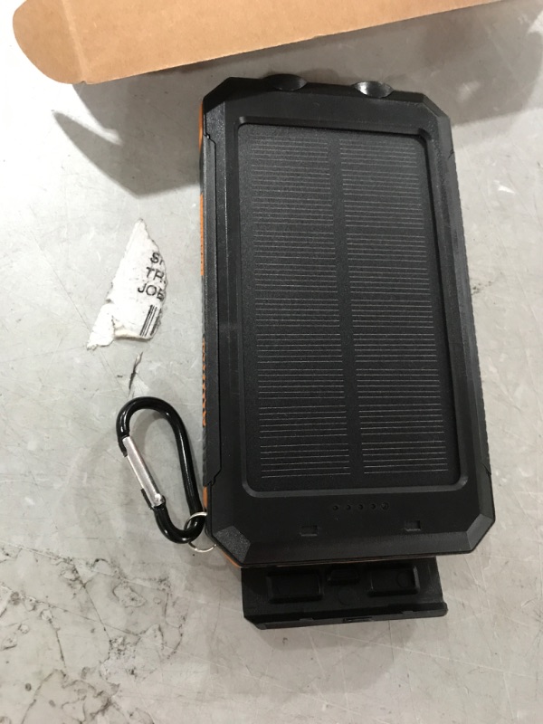 Photo 2 of Solar Charger 20000mAh Solar Power Bank Waterproof Portable Charger with Dual 5V USB Port/LED Flashlight Compatible with All Smartphone External Battery Pack Perfect for Outdoor/Camping/Trip Orange