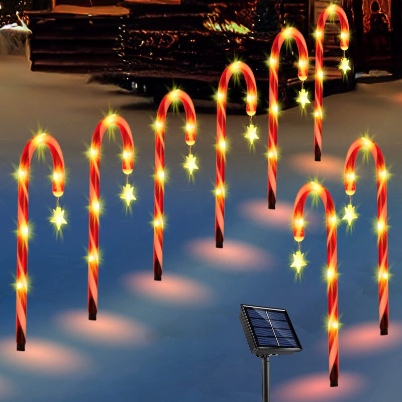 Photo 1 of ALIGHTER 8 Pack Christmas Decorations Outdoor Solar Candy Cane Lights Pathway Markers Lights with Star for Walkway, Driveway, Lawn, Yard, Garden, Home, Indoor & Outdoor Decoration