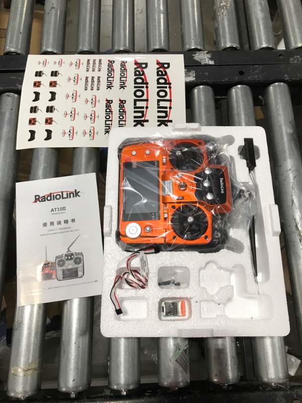 Photo 2 of Radiolink AT10II 12 Channels RC Transmitter and Receiver R12DS 2.4GHz Radio Remote, Voltage Telemetry for RC Airplane, FPV Racing Drone, Quad, Helicopter, Car and Boat (Mode 2 Left-Hand Throttle) Orange