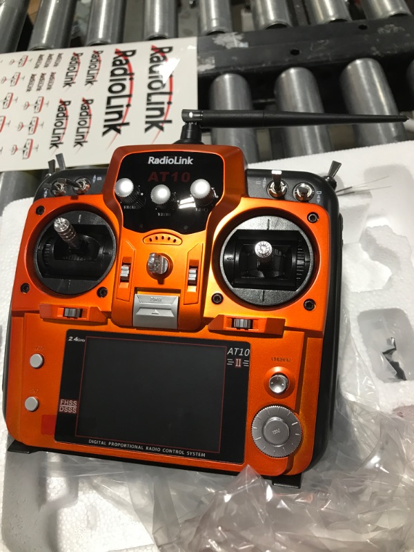 Photo 6 of Radiolink AT10II 12 Channels RC Transmitter and Receiver R12DS 2.4GHz Radio Remote, Voltage Telemetry for RC Airplane, FPV Racing Drone, Quad, Helicopter, Car and Boat (Mode 2 Left-Hand Throttle) Orange