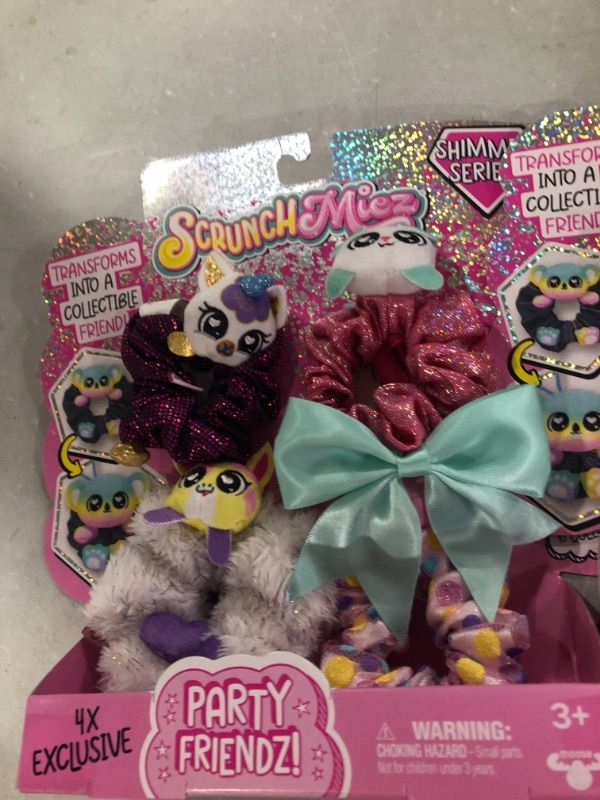 Photo 1 of Scrunchmiez 4 Pack Party Friendz Pack, 4 Exclusive That Magically Transform from Hair Scrunchie to Cute Plush Collectible Friend
