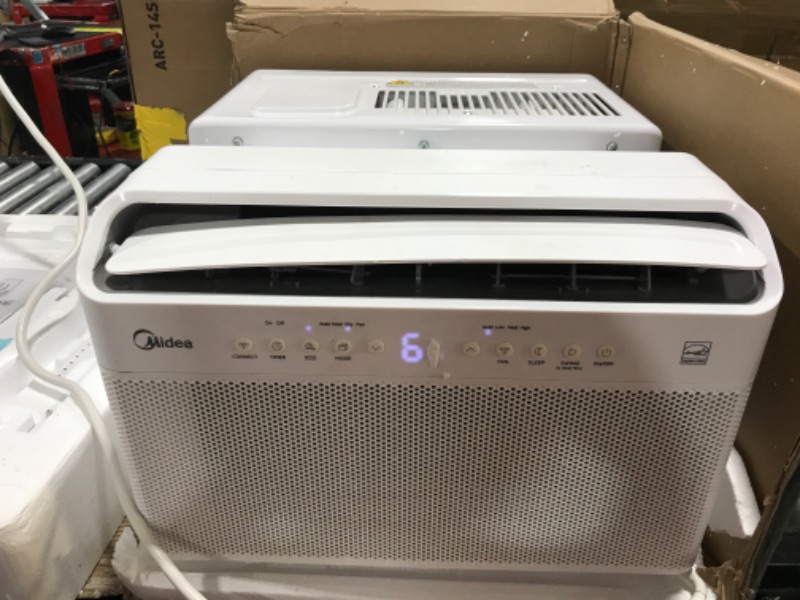 Photo 2 of Midea U Inverter Window Air Conditioner 12,000btu, U-Shaped AC with Open Window Flexibility, Robust Installation,Extreme Quiet, 35% Energy Saving, SMA - minor bent on side of item from pakaging 