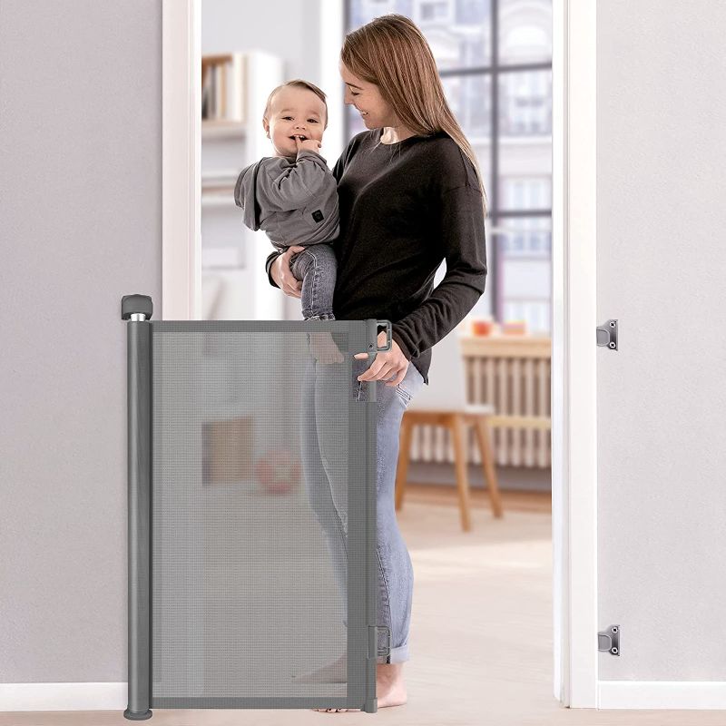 Photo 1 of 
Retractable Baby Gate, Baby Gate for Stairs, Retractable Dog Gate, Baby Gate with Door 33" Tall, Extends to 55" Wide, Mesh Safety Pet Gate for Staircases, Indoors, Outdoors and Hallways, Grey
