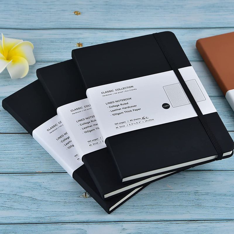 Photo 1 of 3 Pack A5 Journal Notebooks Classic College Ruled Notebooks Hardcover Leatherette Lined Journals for Office Home School Business, 8.3 x 5.5 inch, 100GSM Thick Paper, 160 Pages (Black) 