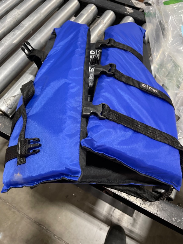 Photo 1 of blue life jacket adults universal