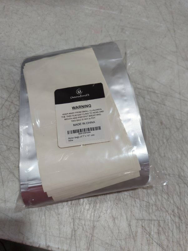 Photo 1 of 50 Packs 12 Mil Mylar Bags with Oxygen Absorbers 400CC, 6 Mil Each Side 1 Quart 10" x 7", Resealable Bag Heat Sealable for Long Term Food Storage