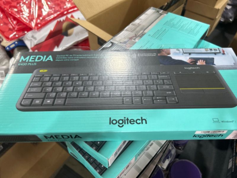 Photo 2 of Logitech K400 Plus Wireless Touch With Easy Media Control and Built-in Touchpad, HTPC Keyboard for PC-connected TV, Windows, Android, Chrome OS, Laptop, Tablet - Black PLUS Floral