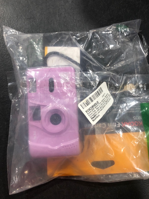Photo 1 of Kodak M35 35mm Film Camera, Reusable, Focus Free, Easy to Use, Build in Flash and Compatible with 35mm Color Negative or B/W Film (Film and AAA Battery NOT Included) (Purple)