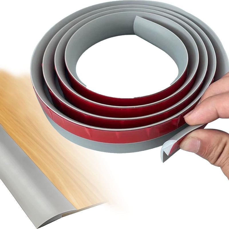 Photo 1 of Floor Transition Strip Carpet & Floor Edge Trim Strip 7FT PVC Capping Strip Self Adhesive Suitable for Threshold Transitions with a Height Less Than 5mm (Grey)
