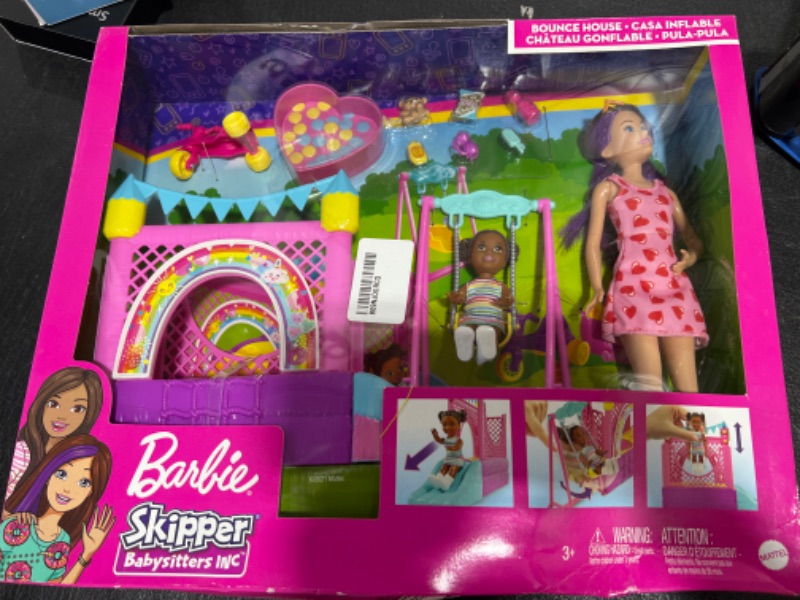 Photo 2 of Barbie Skipper Babysitters Inc Playset with Skipper Doll, Toddler Small Doll, Working Bounce House, Swing & Accessories