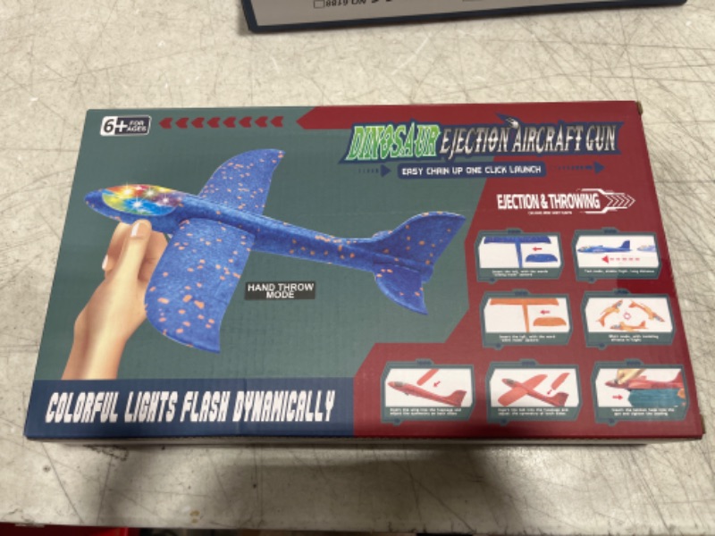 Photo 2 of Aucess Boy Toys 2 Pack Airplanes with Dinosaur Launcher Toys, Birthday Gift for 4+ Years Old Kids 