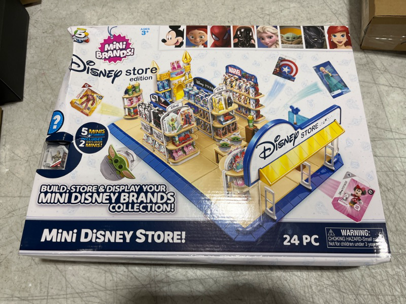 Photo 2 of 5 Surprise Mini Brands Disney Toy Store Playset by Zuru - Disney Toy Store Includes 5 Exclusive Mystery Mini's, Store and Display Mini Collectibles, Toy for Kids, Teens, and Adults