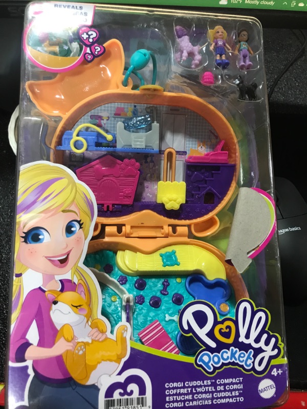 Photo 2 of Polly Pocket Compact Playset, Corgi Cuddles with 2 Micro Dolls & Accessories, Travel Toys with Surprise Reveals (Amazon Exclusive)