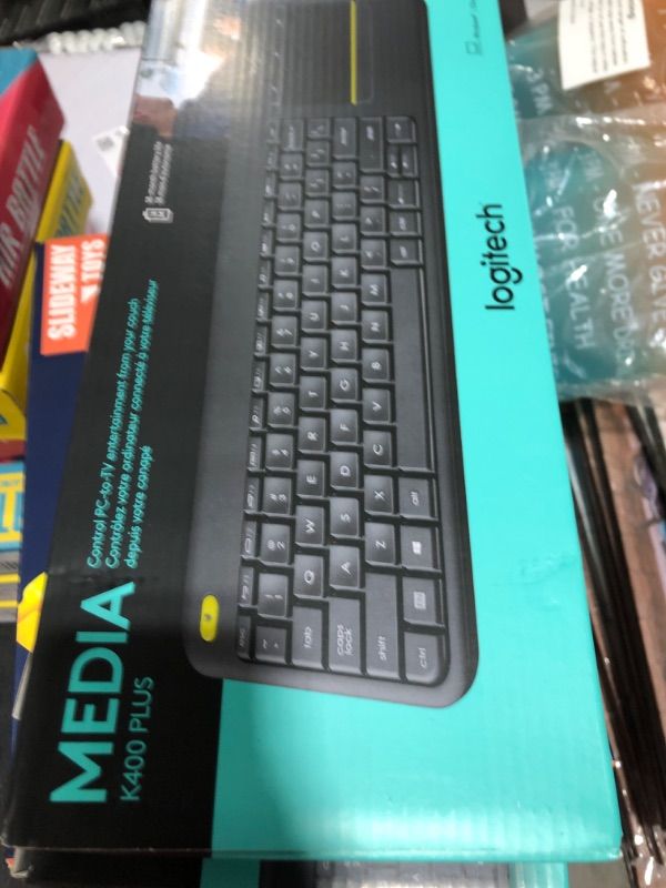 Photo 2 of Logitech K400 Plus Wireless Touch With Easy Media Control and Built-in Touchpad, HTPC Keyboard for PC-connected TV, Windows, Android, Chrome OS, Laptop, Tablet - Black PLUS Floral