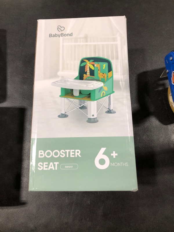 Photo 2 of Baby Travel Booster Seat with Double Tray, BabyBond Upgraded Toddler Portable Baby Chair, Booster Seat for Dining Table, Stable and Foldable Booster Baby Chair for Indoor/Outdoor use (Cyan) Cyan Giraffe