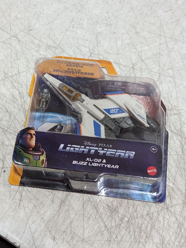Photo 1 of Disney Pixar Lightyear Hyperspeed Series XL-09 Spaceship & Buzz Lightyear Figure, 6 Inch Long Vehicle & 1.25 Inch Figure, Toy 4 Years & Up XL-09 & Buzz