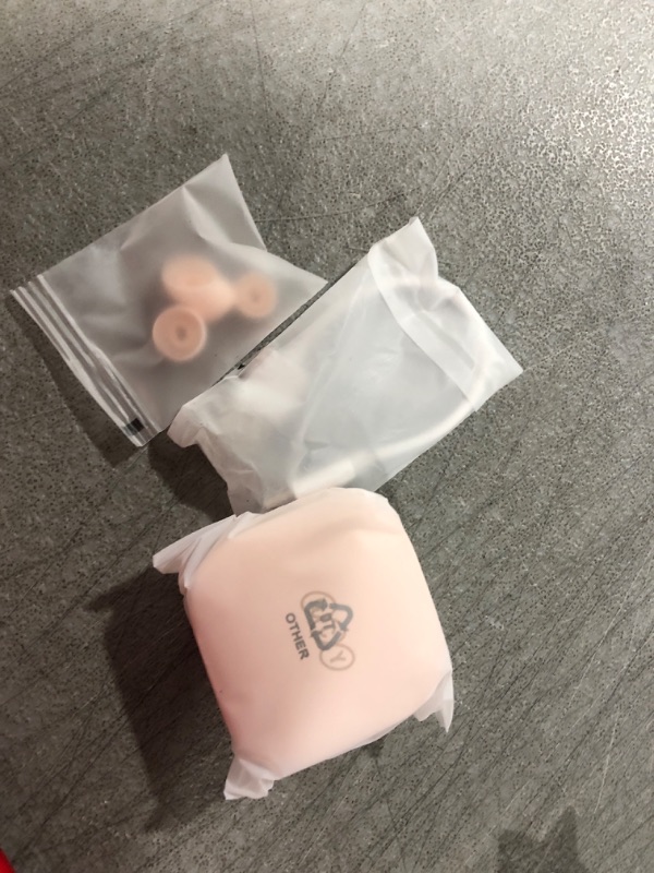 Photo 1 of PINK EARBUDS WITH CHARGER AND EXTRA EAR BUDS