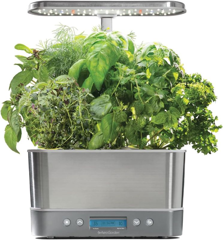 Photo 1 of AeroGarden Harvest Elite Indoor Garden Hydroponic System with LED Grow Light and Herb Kit, Holds up to 6 Pods, Stainless

