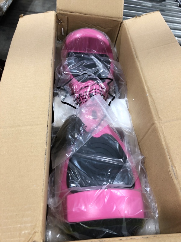 Photo 2 of Hover-1 Rocket Electric Self-Balancing Hoverboard with 6.5” LED Light-Up Wheels, Dual 160W Motors, 7 mph Max Speed, and 3 Miles Max Range Pink 2.0