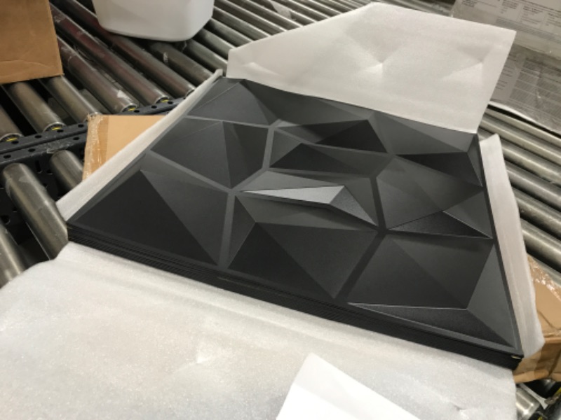Photo 1 of Wodaue 20PCS 3D Wall Panels, 19.7" x 19.7" PVC Diamond Textured Wall Tiles Waterproof 3D Wall Panel Peel and Stick for Living Room Bedroom Showroom Hotel Office, Cover 53 Sq.Ft 20PCS(53sqft) Black