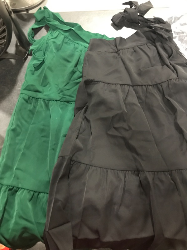 Photo 1 of 2 MINI DRESSES. SIZE UNKNOWN. 1 BLACK, 1 GREEN. ONE SHOULDER