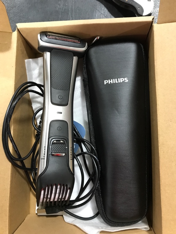 Photo 2 of Philips Norelco Bodygroom Series 7000 Showerproof Body & Manscaping Trimmer & Shaver with case and replacement head for above and below the belt, BG7040/42