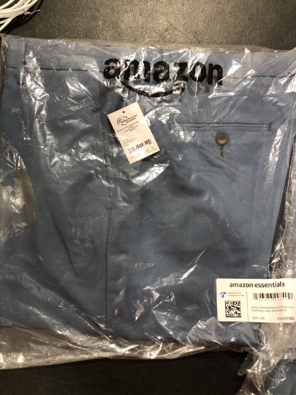 Photo 1 of Amazon Essentials Men's Slim-Fit Flat-Front Dress Pant Polyester Indigo 35W x 34L