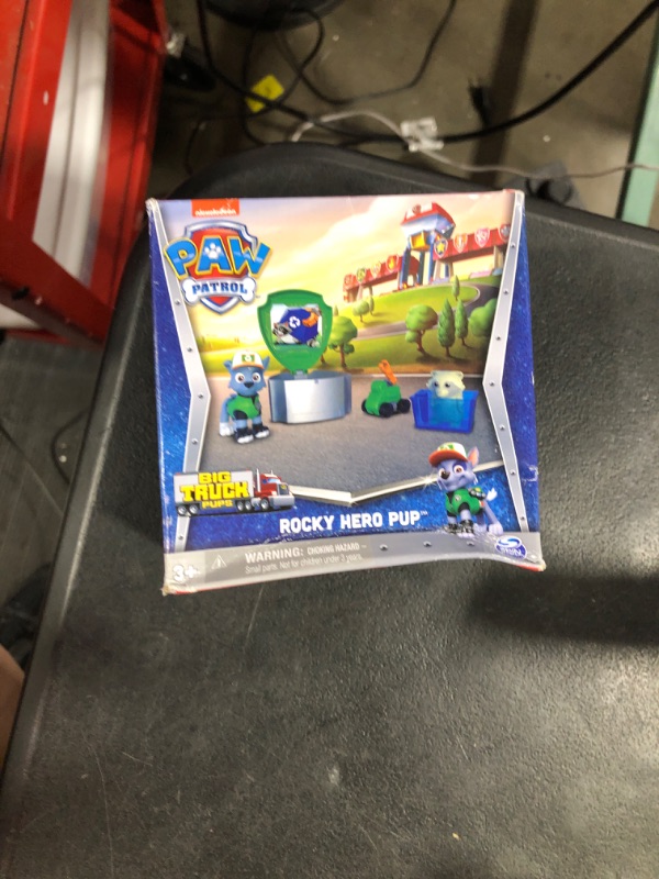 Photo 2 of Paw Patrol, Big Truck Pups Rocky Action Figure with Clip-on Rescue Drone, Command Center Pod and Animal Friend Kids Toys Ages 3 and up