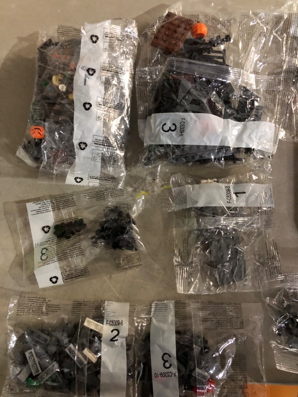 Photo 4 of **SOME LOOSE PIECES. MOST BAGS SEALED**
Nightmare Before Christmas Halloween Jack's and Sally Haunted House Building Set with Led Light (568pcs)