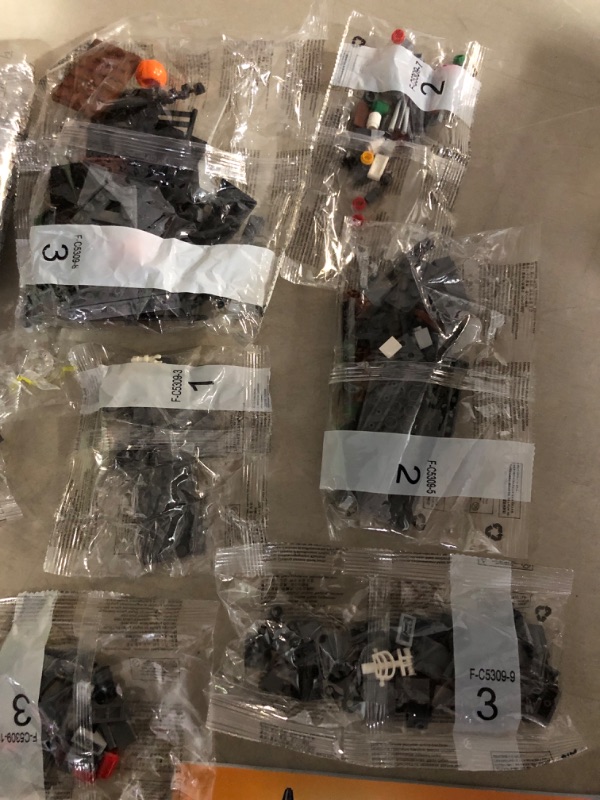 Photo 7 of **SOME LOOSE PIECES. MOST BAGS SEALED**
Nightmare Before Christmas Halloween Jack's and Sally Haunted House Building Set with Led Light (568pcs)