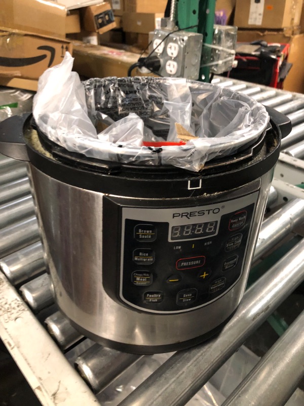 Photo 2 of ***HEAVILY USED - SEE COMMENTS***
Presto 02141 6-Quart Electric Pressure Cooker, Black, Silver, Stainless steel