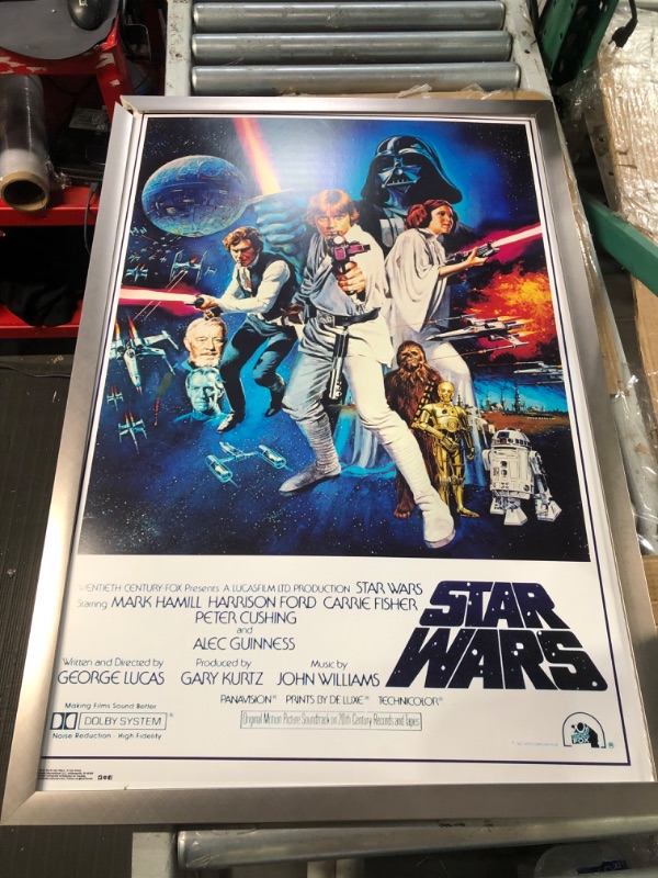 Photo 2 of ****DAMGED FRAME REFER TO PICTURES***Trends International 24X36 Star Wars-V One Sheet Wall Poster, 25.8" x 37.8" x 1", Multicolor 24" x 36" Silver Framed Version