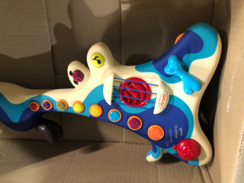 Photo 2 of B. toys- Woofer- Interactive Dog Guitar- Musical Toys- 3 Music Modes- Big & Colorful Buttons – 2 Years +