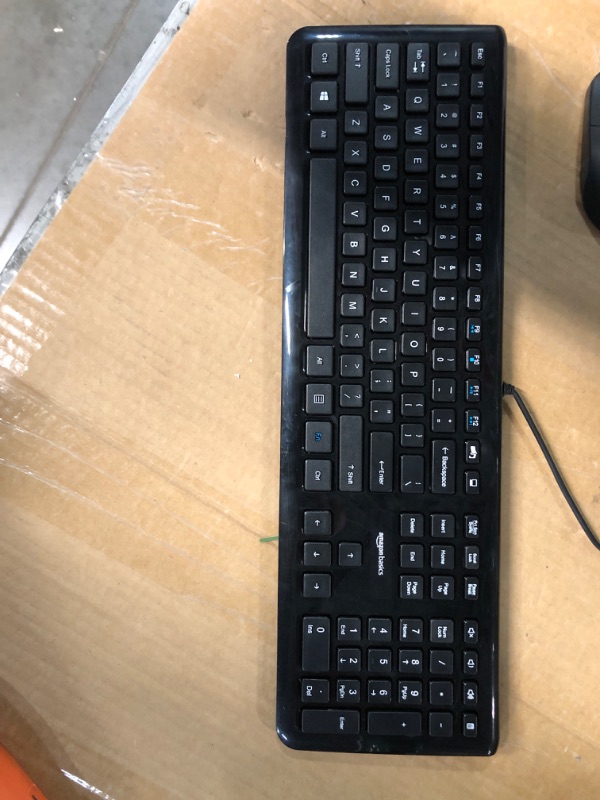 Photo 2 of Amazon Basics Wireless Computer Keyboard and Mouse Combo - Quiet and Compact - US Layout (QWERTY)