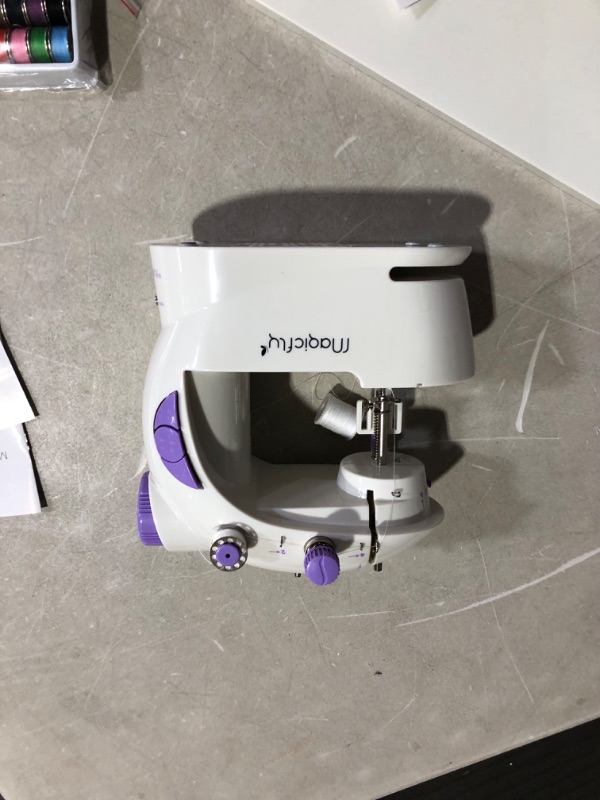 Photo 6 of ***NOT FUNCTIONAL - DOES NOT POWER ON - FOR PARTS - NONREFUNDABLE***
Magicfly Mini Sewing Machine - White