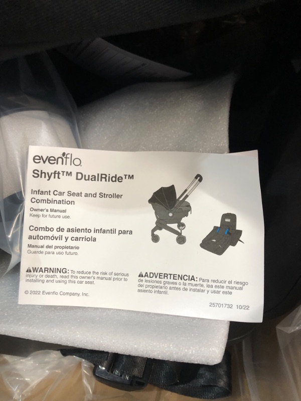 Photo 9 of Evenflo Gold Shyft DualRide Infant Car Seat and Stroller Combo with Carryall Storage (Moonstone Gray)