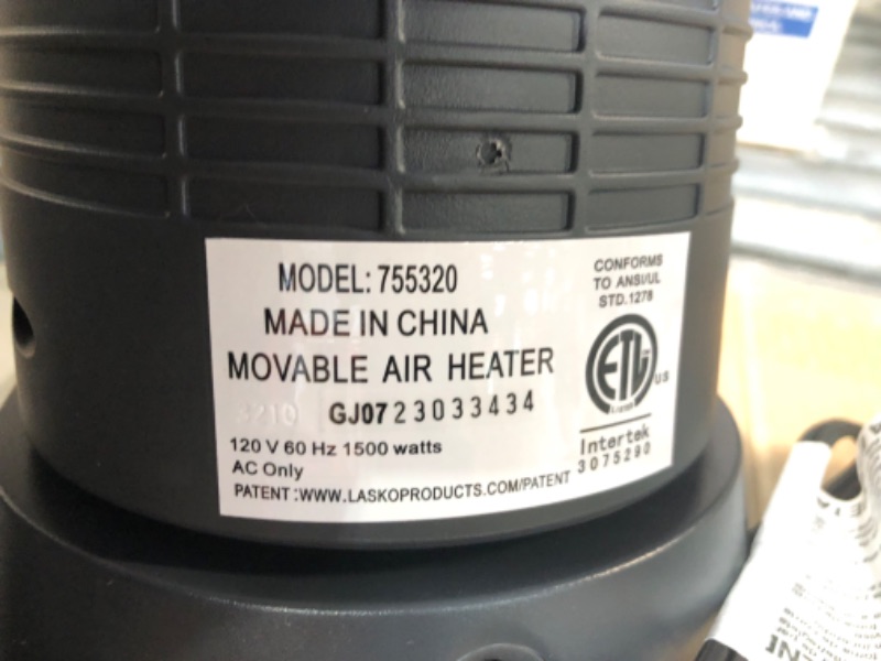 Photo 1 of Lasko 1500W Digital Ceramic Space Heater with Remote, 755320, Silver