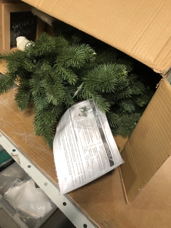Photo 1 of **READ NOTES***
Holiday Living 4-ft Pine Pre-lit Artificial Christmas Tree with Incandescent Lights
