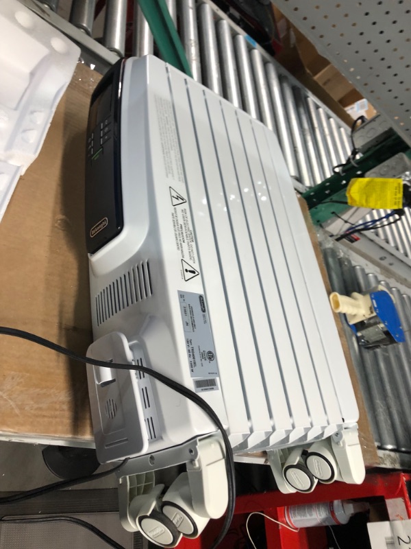 Photo 1 of **READ NOTES****
Delonghi 1500-Watt Oil-Filled Radiant Tower Electric Space Heater