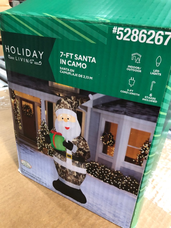 Photo 1 of Holiday Living 7-ft Lighted Santa Christmas Inflatable
