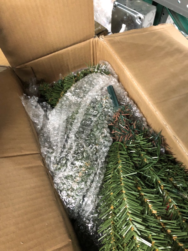 Photo 3 of ***USED LIKE NEW***Puleo International 4.5-Foot Pre-Lit Fraser Fir Pencil 150 UL Clear Lights Artificial Christmas Tree, Ft, Green 4.5' Pencil Fraser Fir with 150 Clear Lights