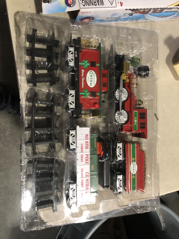 Photo 2 of ***USED - UNABLE TO TEST FURTHER***
Lionel North Pole Central Ready-to-Play Freight Set, Battery-powered Model Train Set with Remote Multi, 50 x 73" 50 x 73 in