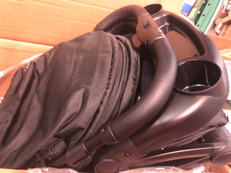 Photo 4 of Mompush Lithe V2 Lightweight Stroller + Snack Tray, Ultra-Compact Fold & Airplane Ready Travel Stroller, Near Flat Recline Seat, Cup Holder, Raincover & Travelbag Included Black