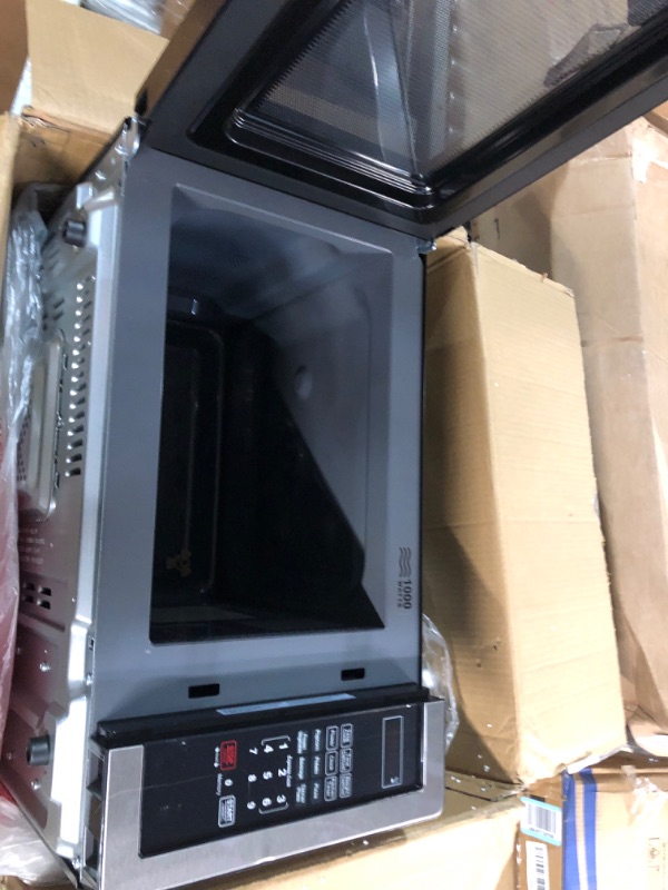 Photo 1 of **SEE NOTES/NON-REFUNDABLE FOR PARTS**
Farberware Countertop Microwave 1.1 Cu. Ft. 1000-Watt Compact Microwave Oven