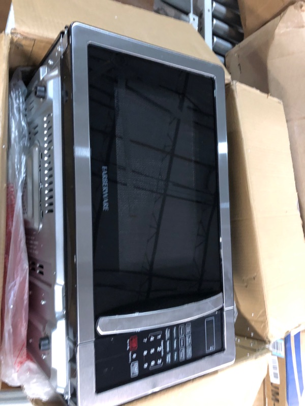 Photo 1 of **SEE NOTES/NON-REFUNDABLE FOR PARTS**
Farberware Countertop Microwave 1.1 Cu. Ft. 1000-Watt Compact Microwave Oven