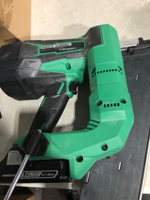 Photo 2 of  * will not charge * sold for parts/repair * 
Metabo HPT Cordless Framing Nailer Kit, 18V, Brushless Motor, 2" Up To 3-1/2" Framing Nails